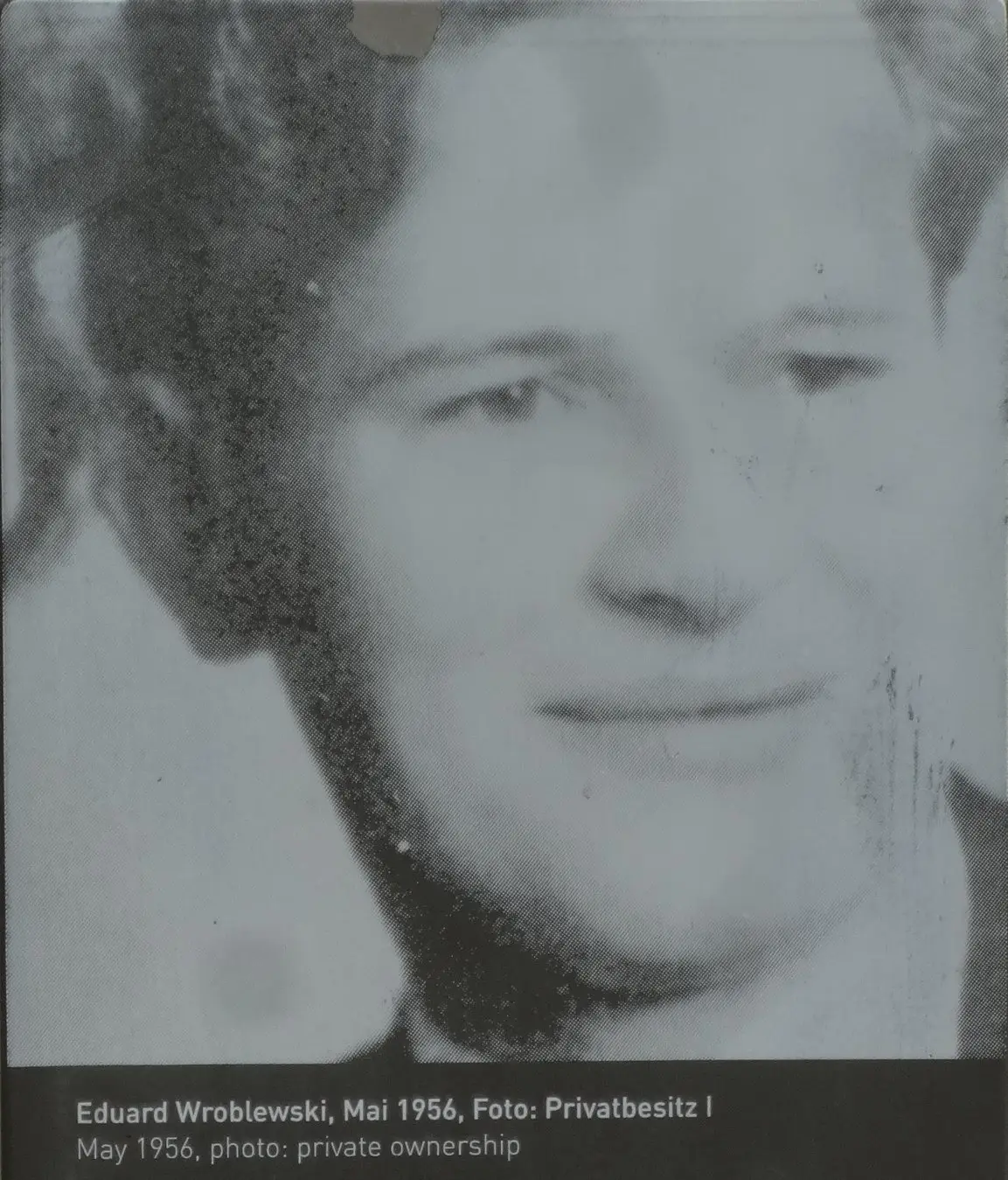 Grainy black-and-white portrait of a young man with swept-back hair, with the caption "Eduard Wroblewski, Mai 1956, Foto: Privatbesitz"
