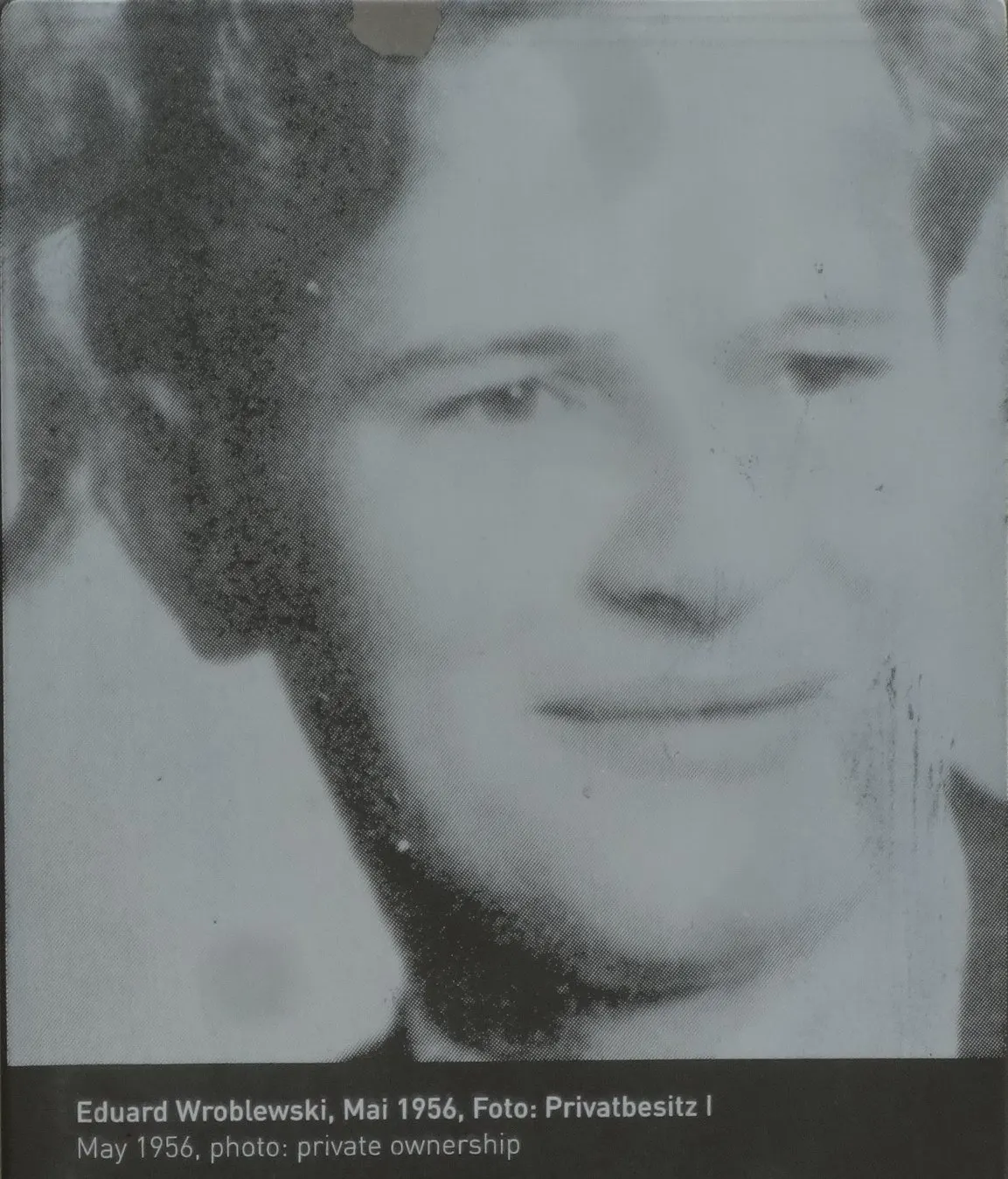Grainy black-and-white portrait of a young man with swept-back hair, with the caption "Eduard Wroblewski, Mai 1956, Foto: Privatbesitz"