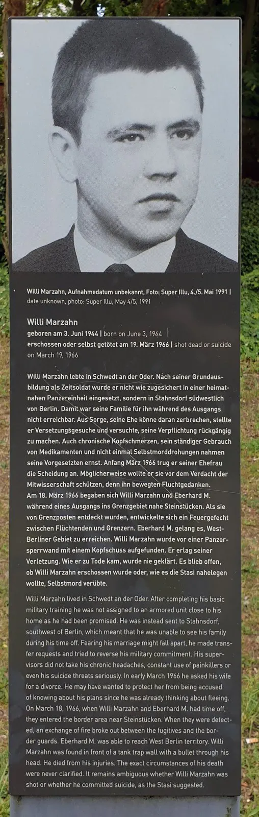 Panel with a large black-and-white photograph of a young man in a white shirt and tie, above German and English text headed "Willi Marzahn"
