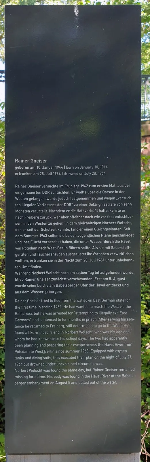 Dark panel without a photograph, with a German and English text headed 'Rainer Gneiser', born 10 January 1944, drowned 28 July 1964