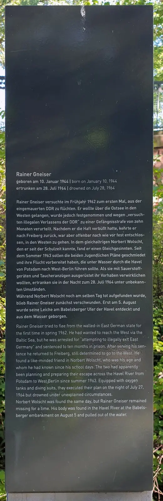 Dark panel without a photograph, with a German and English text headed 'Rainer Gneiser', born 10 January 1944, drowned 28 July 1964