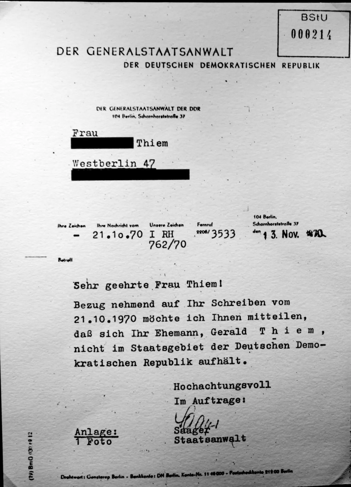 Typewritten letter on official letterhead with a BStU archive stamp and names partly blacked out