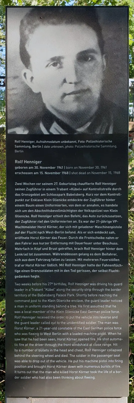 Panel with a black-and-white photograph of a young man in uniform, above German and English text headed "Rolf Henniger"