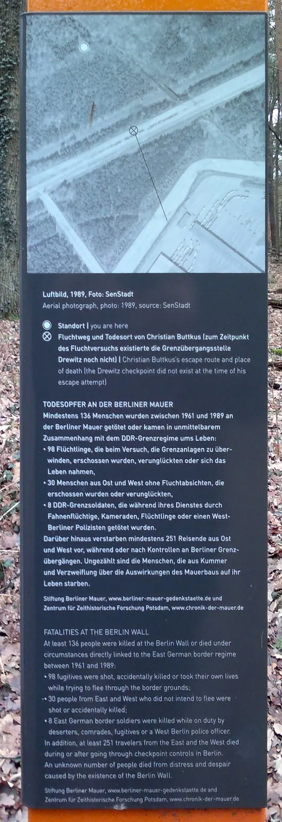 Information panel with a snowy aerial photograph with a marked line and point, above text